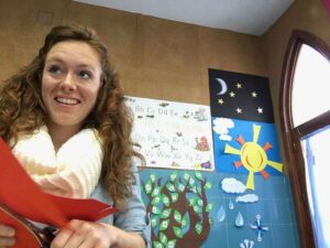 English Language Assistant looking excited in a Spanish classroom