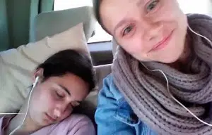 two girls smiling and taking a nap, typical of Spanish culture