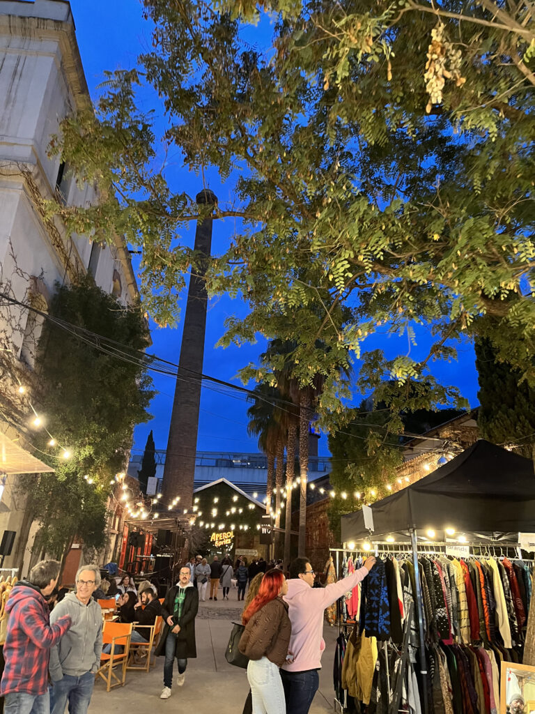 places to visit in barcelona: vintage clothes stall at Palo Market